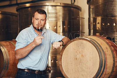 Buy stock photo Aroma, glass and thinking with man in wine cellar for industry, manufacturing or production. Barrel storage, idea and sommelier smelling scent of alcohol at winery for distillation or fermentation