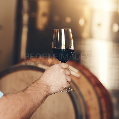 Buy stock photo Barrel, hand and wine maker with glass in cellar for tasting, process or production. Supplier, winery and sommelier person with product for alcohol drink, craft or liquor manufacturing in warehouse