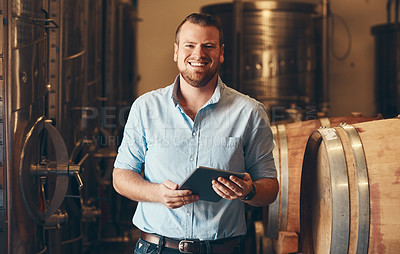 Buy stock photo Portrait, man and smile with tablet in brewery as manager with pride on product, process and schedule for supplier. Business, barrel and happy for beer production, manufacturing or craft in factory