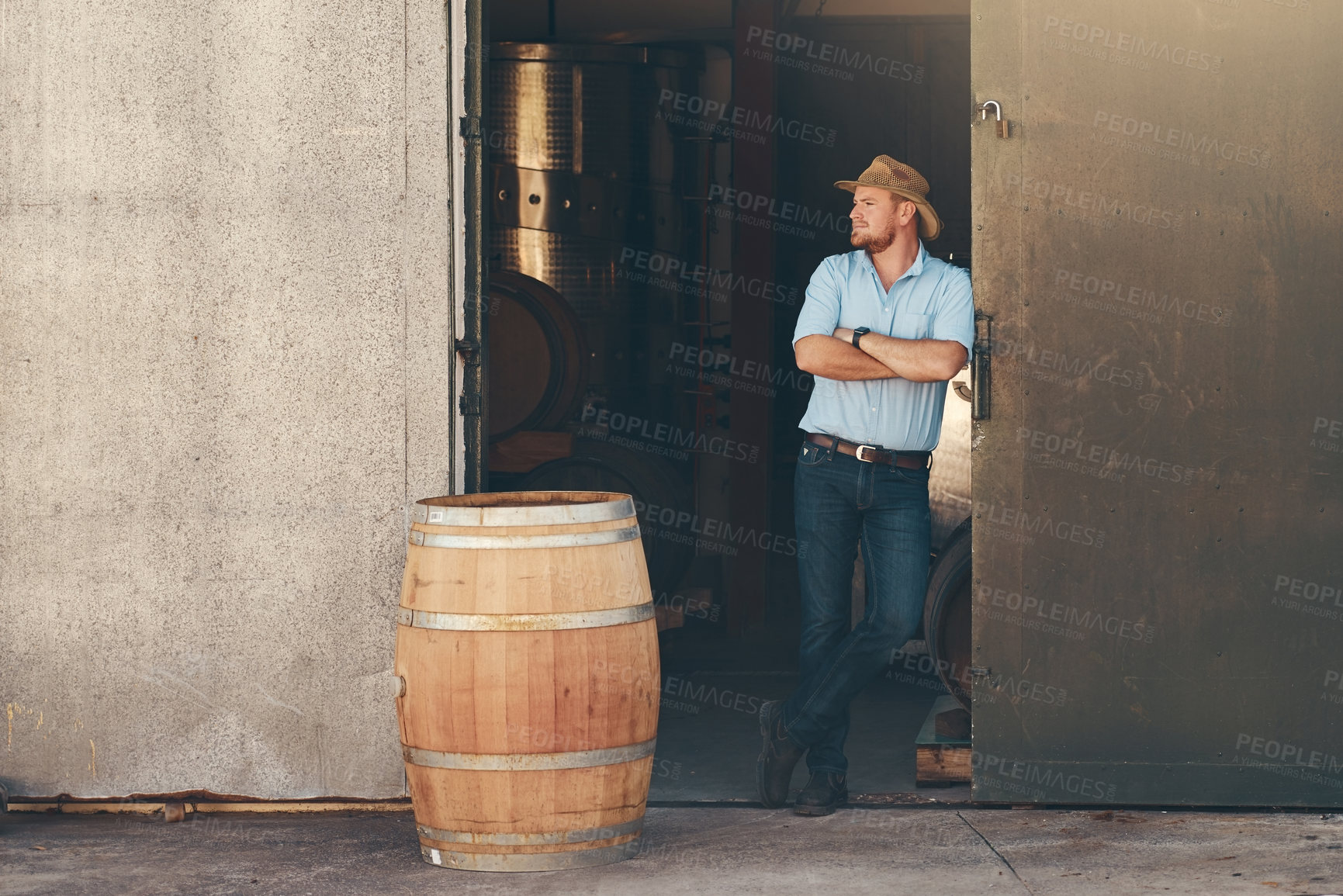 Buy stock photo Business, man and thoughtful in brewery for working, confident or manufacturing for beer production. Factory, manager or inspection with arms crossed for alcohol process, barrel or think in warehouse