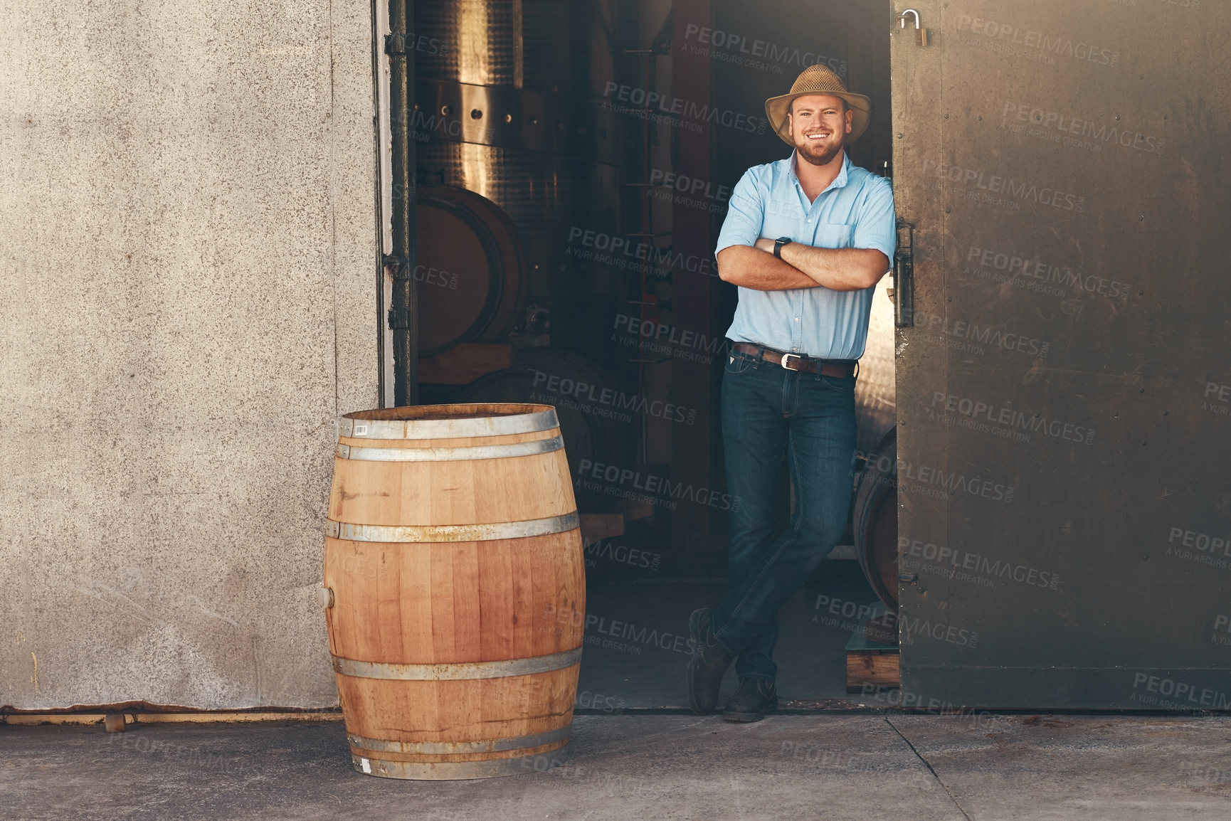 Buy stock photo Business, man or portrait with pride in brewery, working or manufacturing for beer production. Factory, male manager or inspection with arms crossed for alcohol process, barrel or career in warehouse