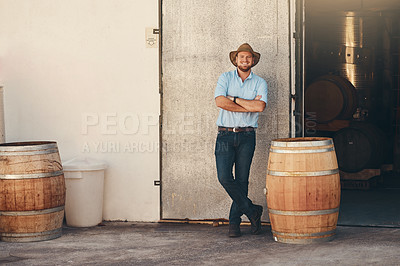 Buy stock photo Business, man or portrait with arms crossed in brewery, working or manufacturing for beer production. Factory, male manager or inspection with pride for alcohol process, barrel or career in warehouse