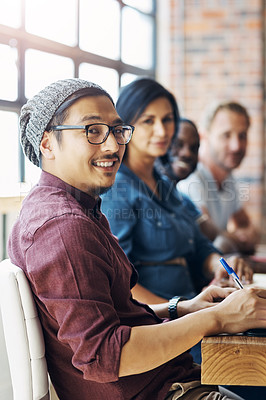 Buy stock photo Portrait of a group of businesspeople sitting in an office