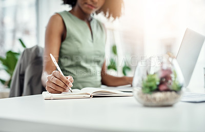 Buy stock photo Notebook, writing and businesswoman in office, laptop and agenda or minutes from virtual meeting. Computer, video call and notes for planning in workplace, brand manager and professional employee