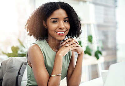 Buy stock photo Cropped portrait of an attractive young businesswoman working at her desk in the office