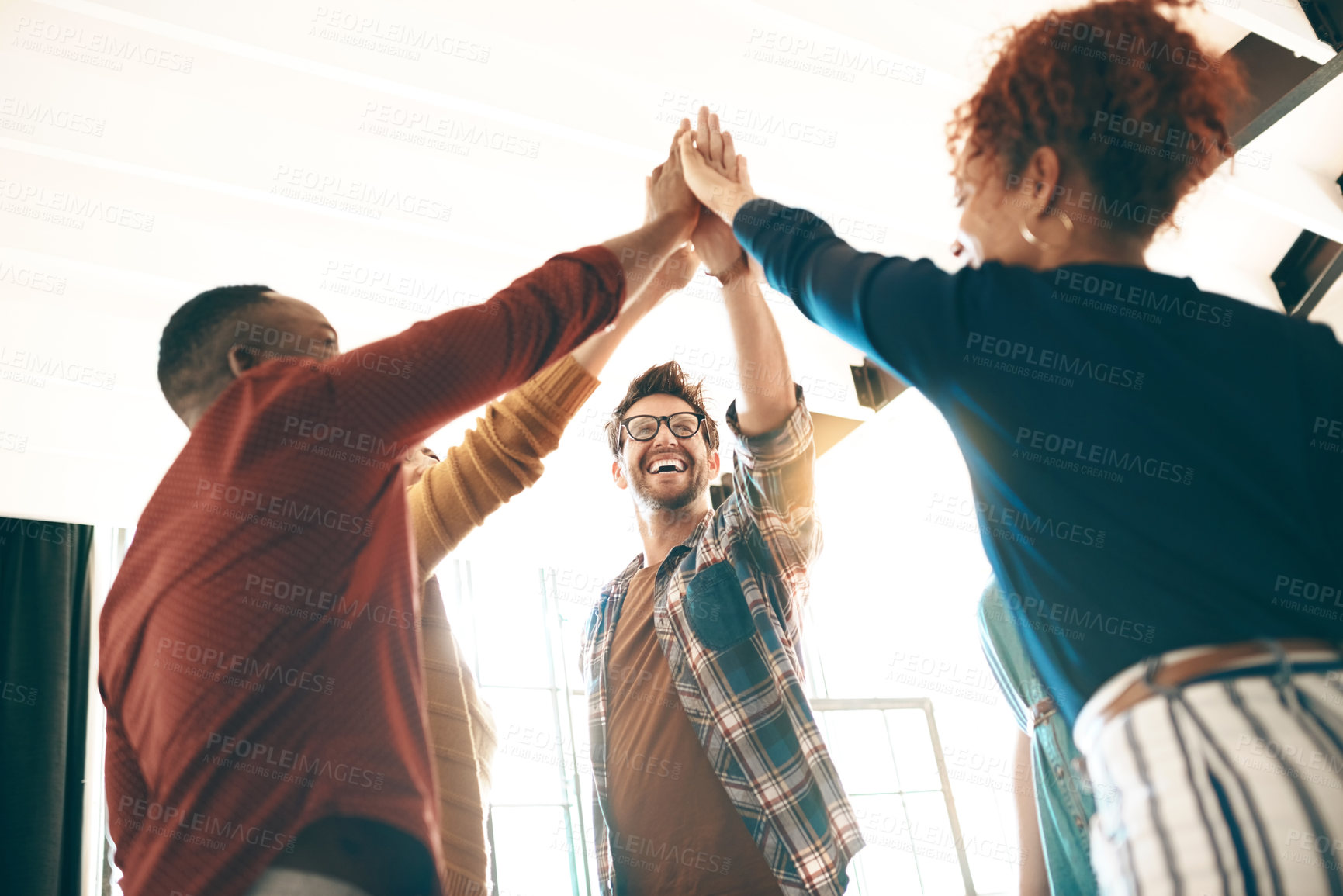 Buy stock photo Creative, team and high five in office with energy, creativity and collaboration in business. Employees, synergy or gesture in workplace for community, inclusion or excited for cooperation with trust