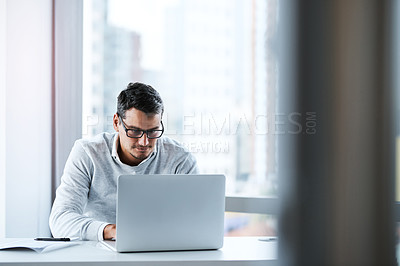 Buy stock photo Research, internet and business man with laptop in office for sales representative, online review and report. Creative, product specialist and typing with employee for proposal, website and idea