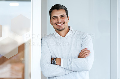 Buy stock photo Portrait of a young businessman standing in an office