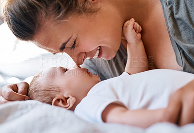 Buy stock photo Mom, baby and happy on bed in home for support, love and care for growth and child development. Parent, kid and happy in bedroom with playing for bonding, childhood memories and smile with toddler