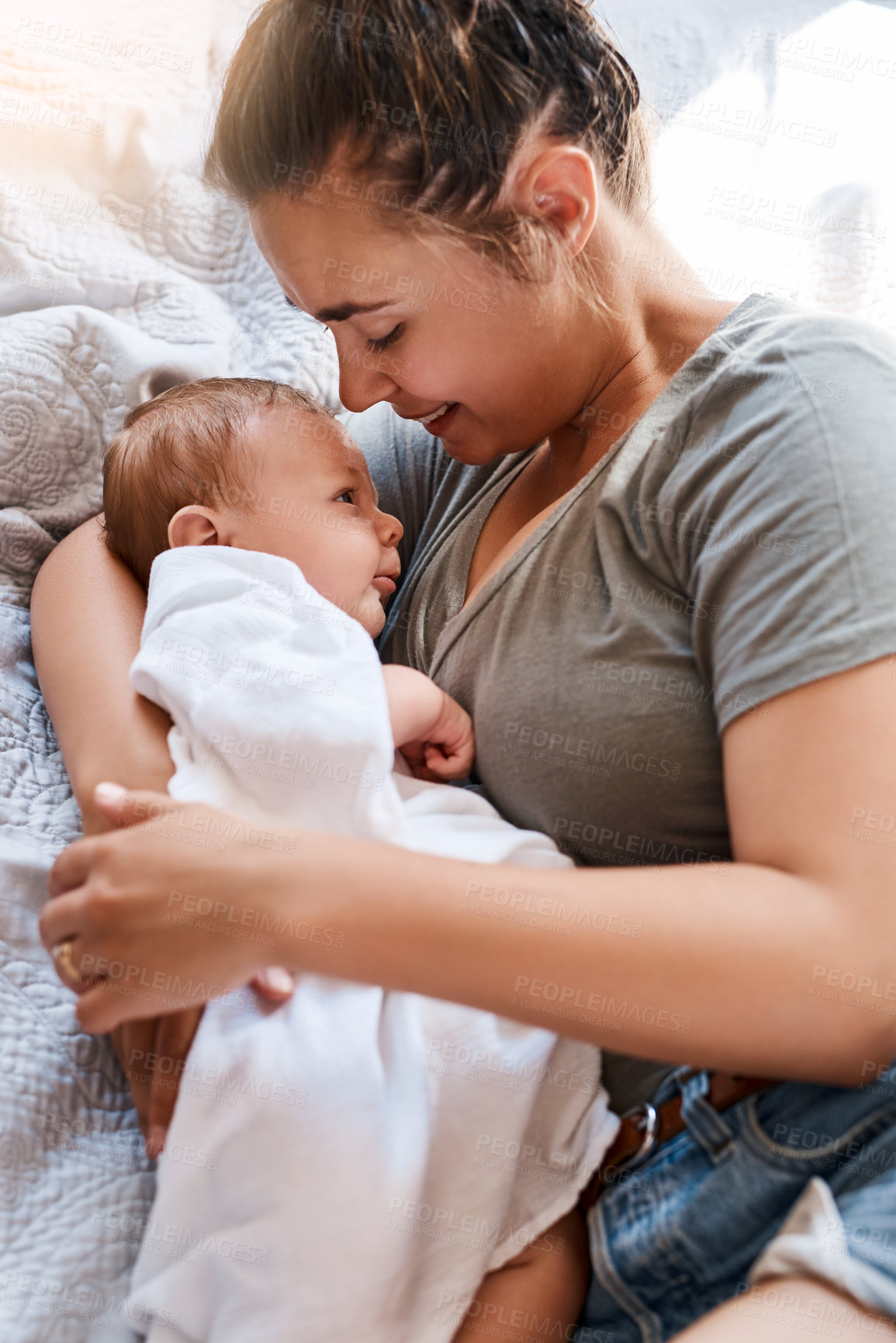 Buy stock photo Mom, newborn and happy on bed in home for support, love and care for growth and child development. Parent, kid and smile in bedroom with trust for bonding, childhood memories and toddler