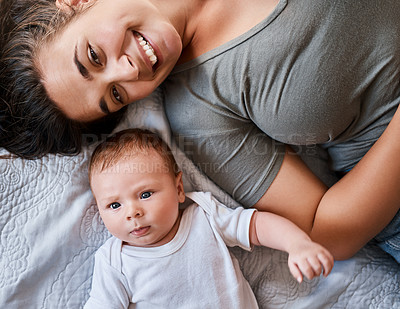 Buy stock photo Portrait, mother and baby in bed at home for relax, rest and bonding together as family. Happy people, mom and boy infant in bedroom for embrace with love, support or security as parent in apartment