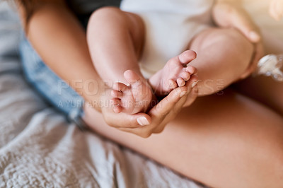 Buy stock photo Feet, mother and holding baby on bed with care for support, connection or bonding together in bedroom. Home, infant kid and family woman in nursery with love for growth, child development or comfort