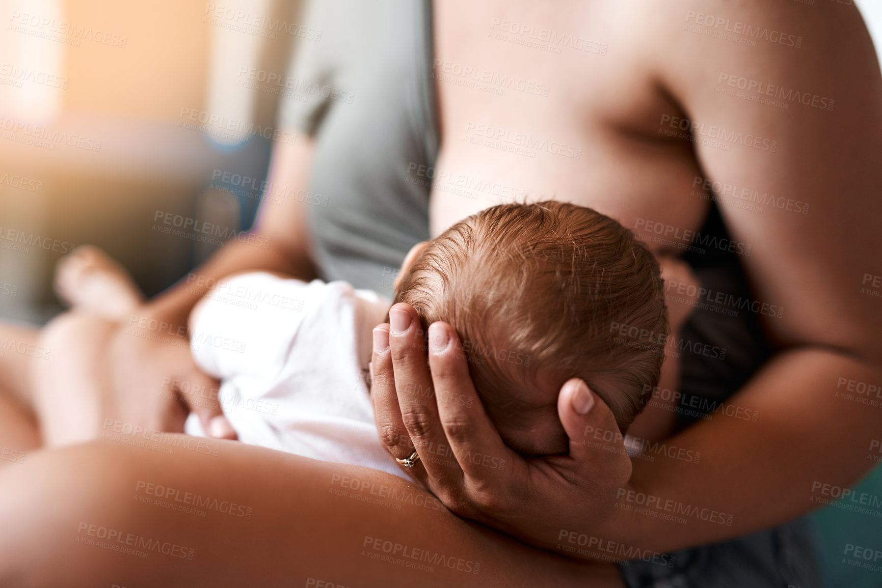 Buy stock photo Breastfeeding, baby and young mother in bedroom for growth development, nutrition or digestive health. Care, infant and woman with newborn child for natural milk, wellness or bonding in home