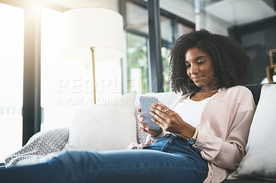 Buy stock photo Relax, search and woman on sofa with phone, smile and online chat on calm morning in home. Smartphone, reading and girl on couch with scroll on mobile app for social media, connection and networking