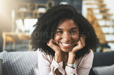 Buy stock photo Shot of an attractive young woman relaxing at home