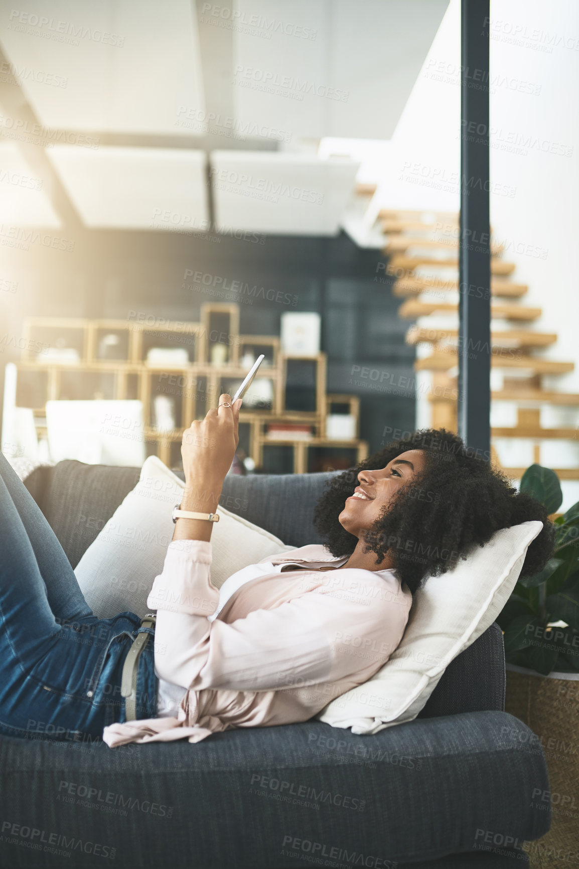 Buy stock photo Relax, smile and woman on sofa with phone, search and online chat on calm morning in home. Smartphone, reading and girl on couch with scroll on mobile app for social media, connection and networking