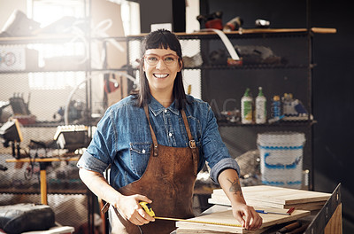 Buy stock photo Cropped portrait of an attractive young woman working in her creative workshop