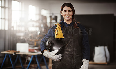 Buy stock photo Cropped portrait of an attractive young creative female artisan standing in her workshop with her helmet tucked under her arm