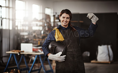 Buy stock photo Cropped portrait of an attractive young creative female artisan flexing in her workshop with her helmet tucked under her arm