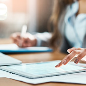 Checking all her digital notes | Buy Stock Photo on PeopleImages ...