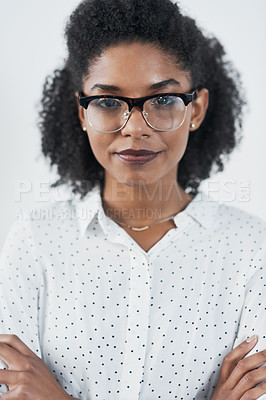 Buy stock photo Serious, business and portrait of black woman with arms crossed in studio isolated on white background. Glasses, confidence or face of African female professional, entrepreneur or person from Nigeria