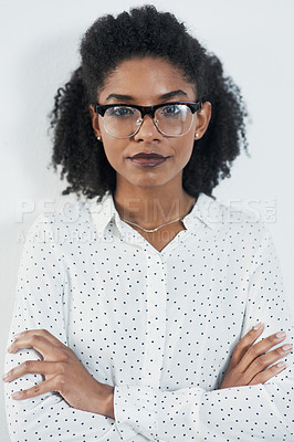 Buy stock photo Business portrait, serious and black woman with arms crossed in studio isolated on a white background. Glasses, confidence and face of African female professional, entrepreneur or person from Nigeria