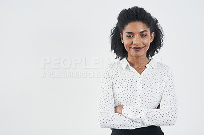 Buy stock photo Studio shot of a confident young businesswoman against a gray background