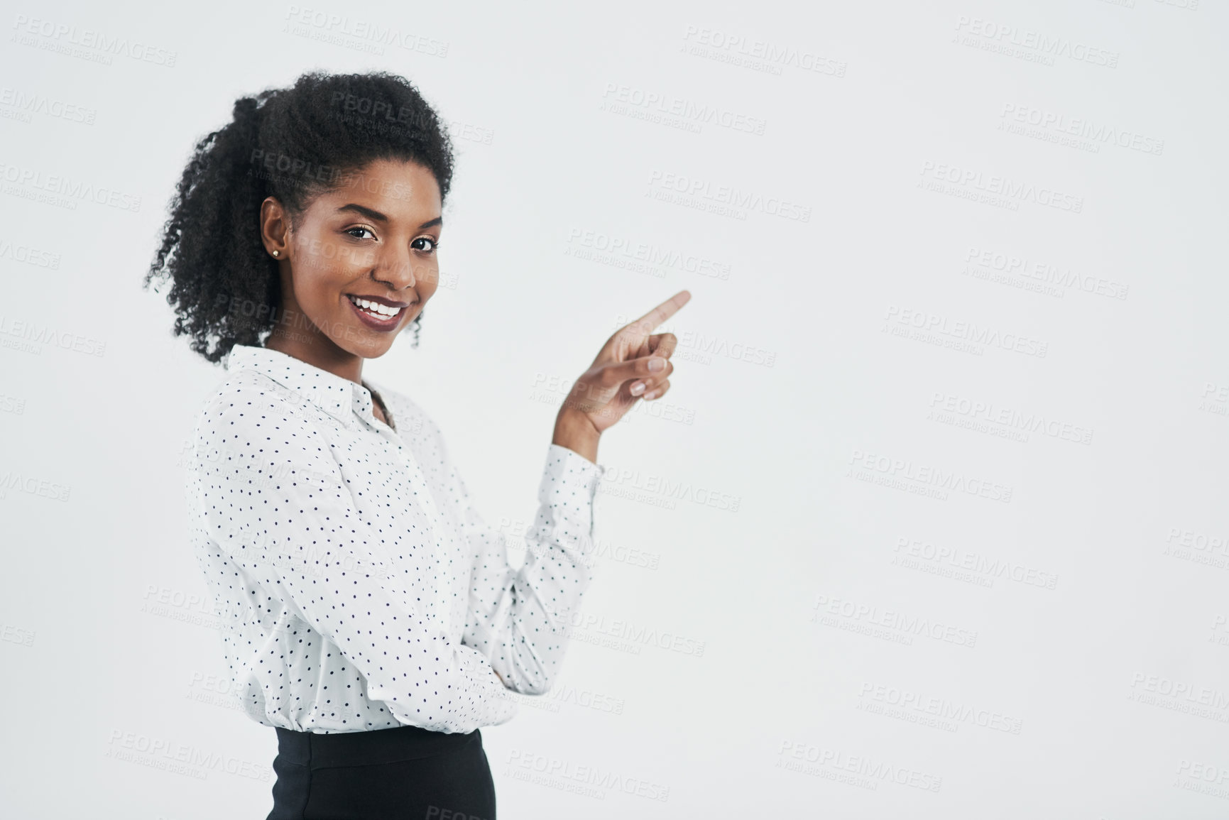 Buy stock photo Pointing, happy and portrait of business black woman in studio for promotion on white background. Advertising, professional and isolated person with hand gesture for announcement, news or information