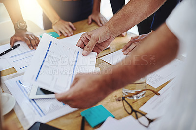 Buy stock photo Cropped shot of a group of unrecognizable creative employees working in a modern office