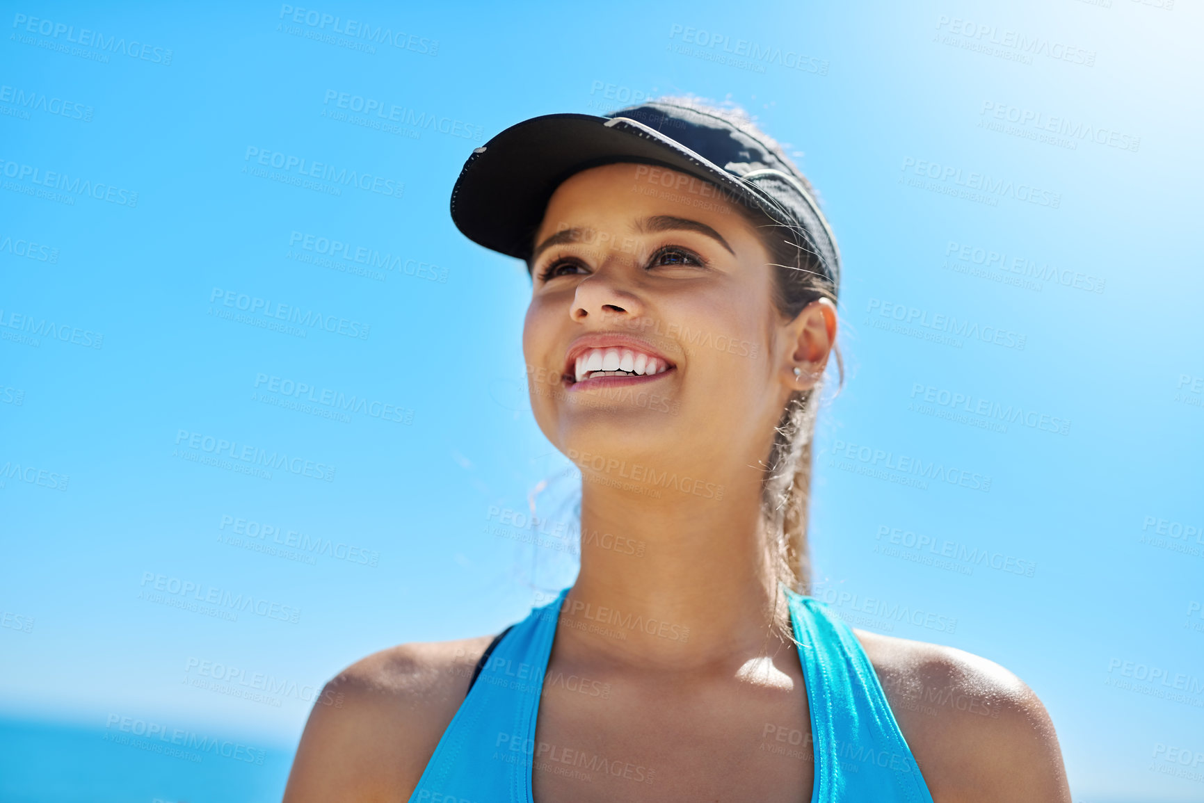 Buy stock photo Thinking, smile and woman at beach for fitness, summer workout or sports exercise with blue sky. Ocean, happy and female athlete at sea for wellness, health and training routine in Miami nature