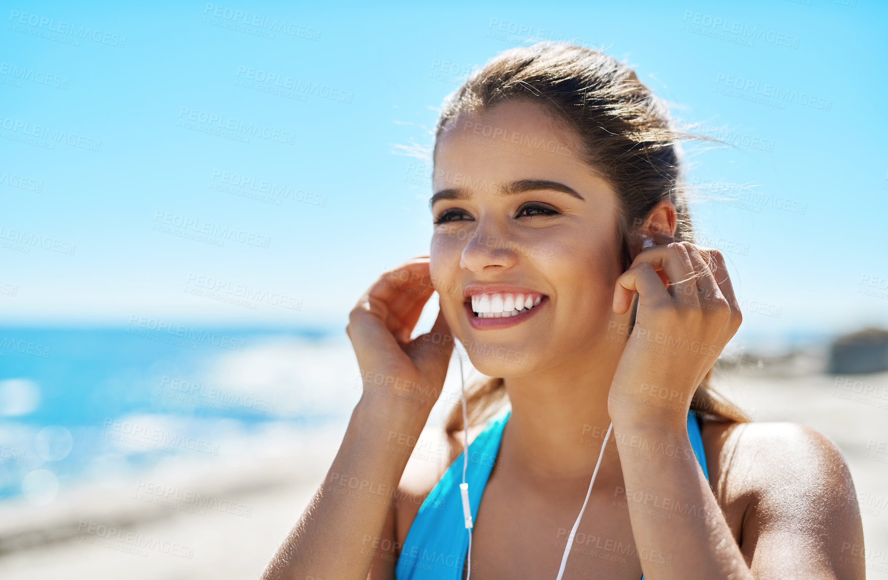 Buy stock photo Earphones, thinking and woman by beach for running with music, podcast or radio online. Fitness, tech and female athlete streaming workout playlist for cardio exercise for marathon training by sea.