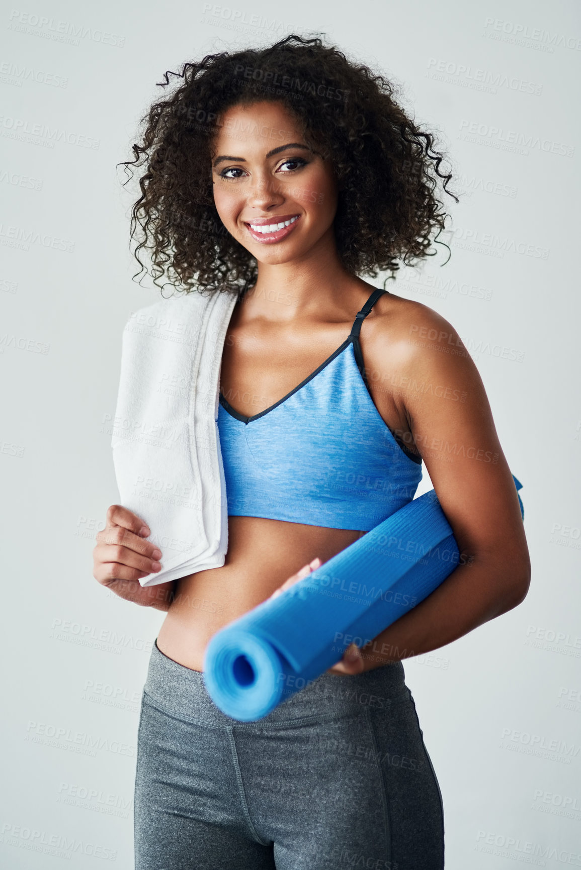 Buy stock photo Exercise mat, smile and portrait of woman in studio for self care, wellness and fitness in morning. Confident, athlete and person with towel for training, workout and healthy body on white background