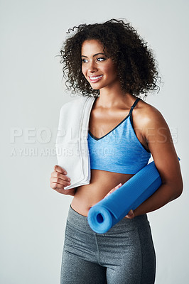 Buy stock photo Studio shot of an athletic young woman against a grey background