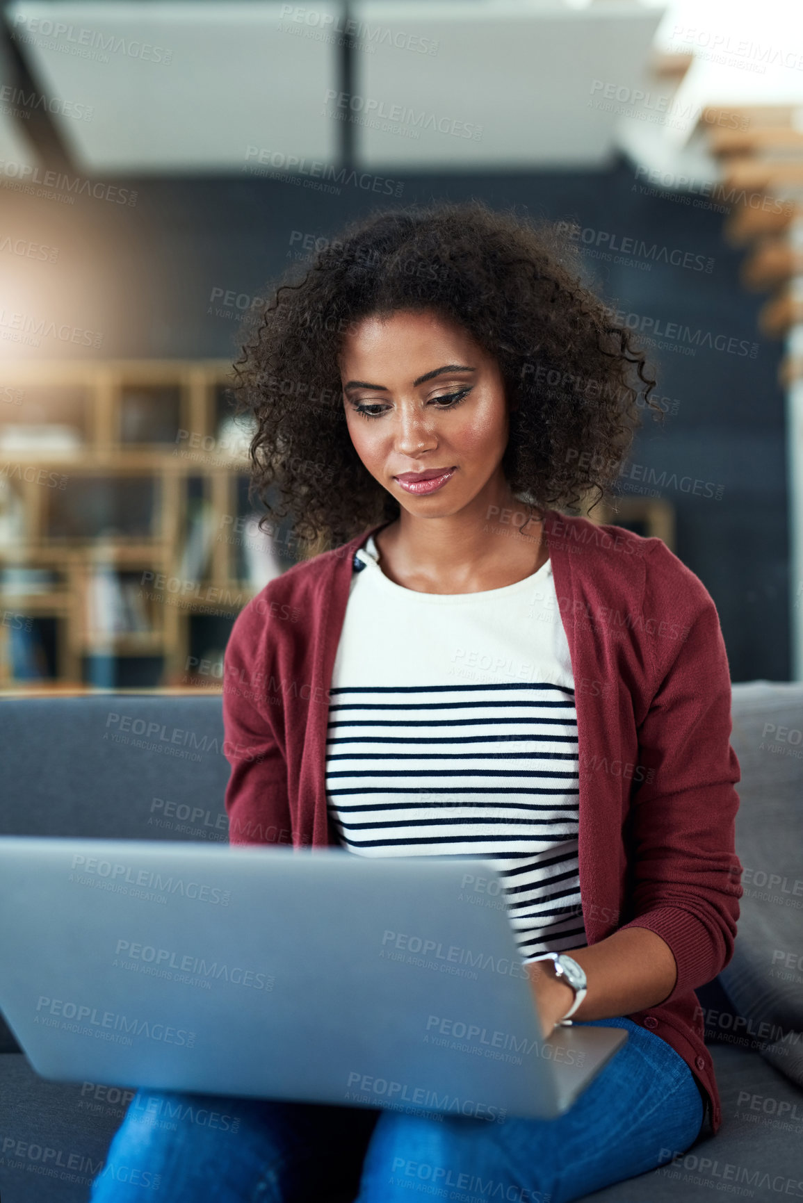 Buy stock photo Woman, home and serious on sofa with laptop for remote work as freelance writer or blogger. Female person, employee and smile as journalist with lifestyle blog, article and story for magazine