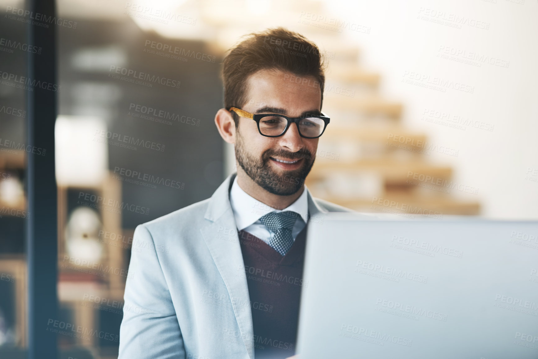 Buy stock photo Business man, glasses and laptop in office for networking, research and project management with kpi. Corporate employee, happy and tech in workplace for positive email, investment and revenue report