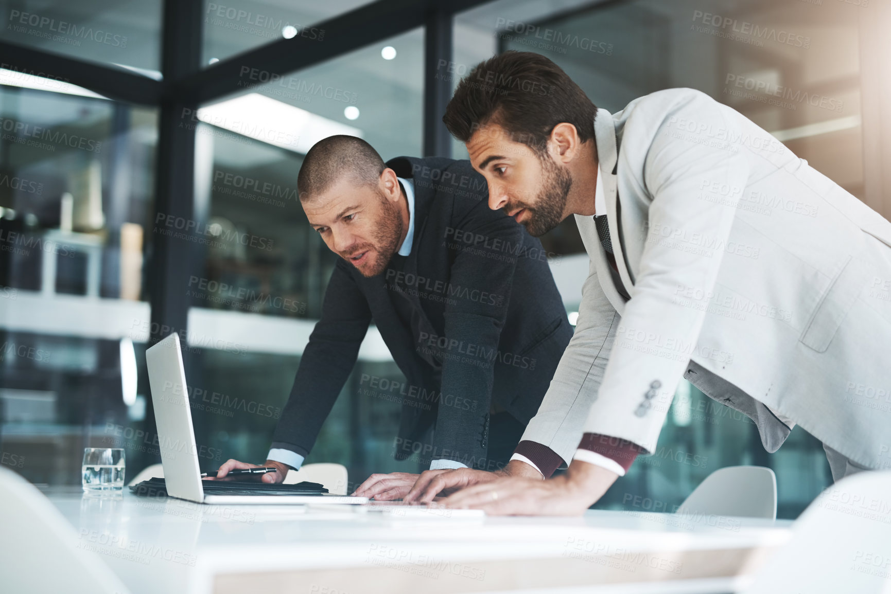 Buy stock photo Cropped shot of businesspeople working together in the office