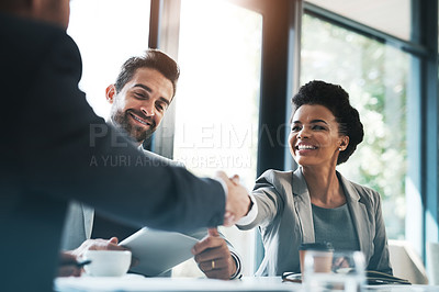 Buy stock photo Business people, handshake and meeting for partnership, teamwork or collaboration in boardroom at office. Happy woman shaking hands in team recruiting, introduction or b2b agreement at the workplace