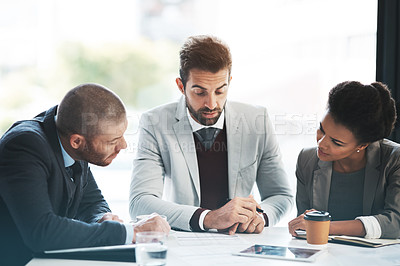 Buy stock photo Cropped shot of businesspeople working together in the office