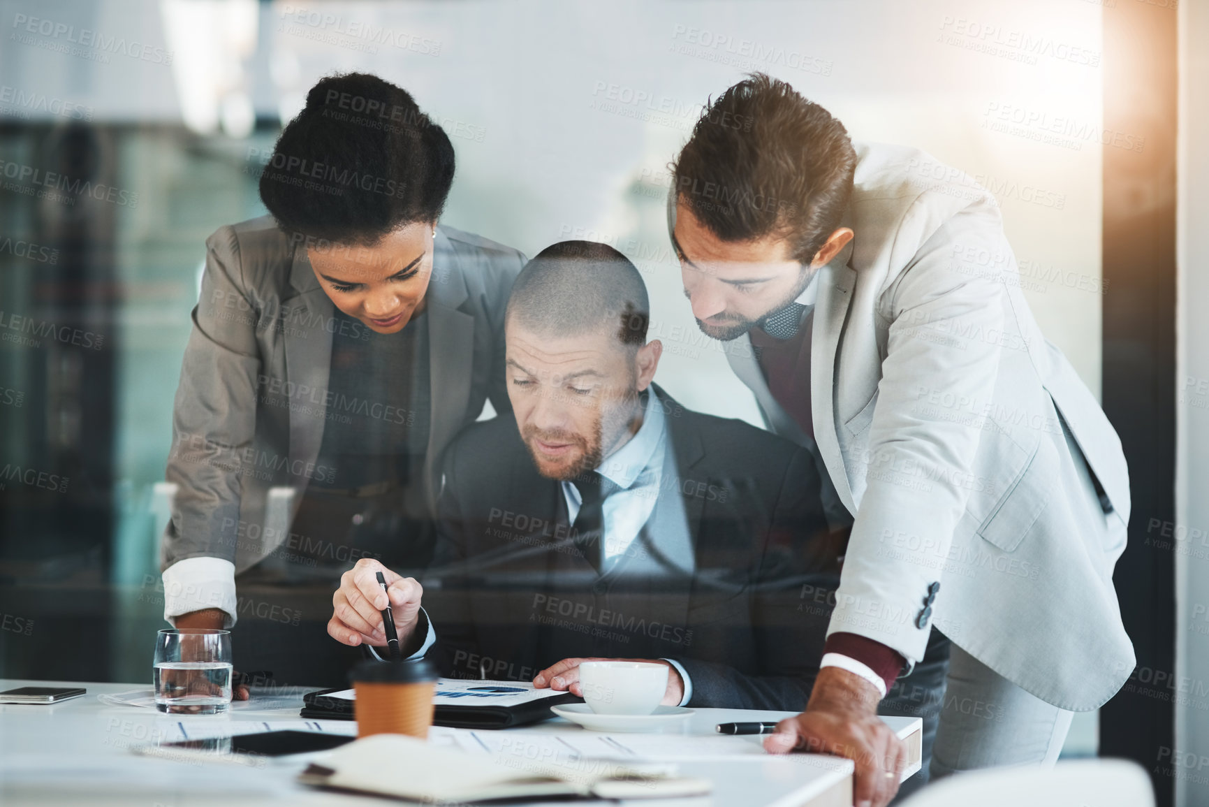 Buy stock photo Cropped shot of businesspeople working together in the office