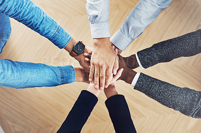 Buy stock photo Teamwork, partnership or hands of business people in support for faith, vision or strategy in office. Above, diversity or employees in group collaboration with hope or mission for goals together 