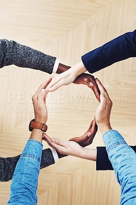 Buy stock photo Above, recycling or hands of business people in circle for motivation, support or sustainability in office. Teamwork, recycle or employees for sustainable goals, community help or partnership group