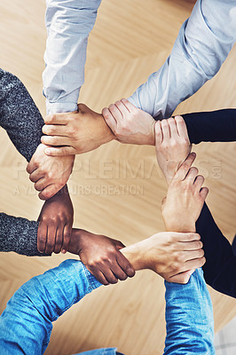 Buy stock photo Teamwork, holding or hands of business people with diversity for office support or collaboration. Trust, link or above of group of employees with mission or team building for startup goals together 