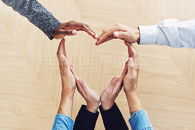 Buy stock photo Teamwork, heart or hands of business people in support for trust, diversity or community inclusion in office. Love gesture, above or employees in group collaboration with hope or kindness for charity