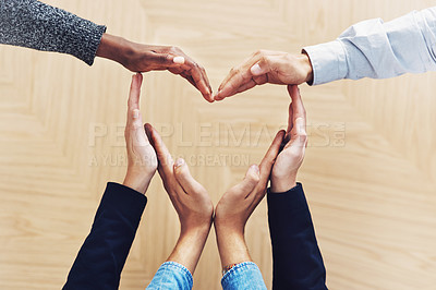 Buy stock photo Community, heart or hands of business people in support for trust, teamwork or diversity inclusion in office. Love gesture, above or employees in group collaboration with hope or kindness for charity