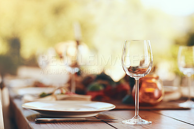 Buy stock photo Empty wine glass, plate and cutlery on a table for a dinner, party or event at a restaurant. Glass, table setting and dinnerware for an outdoor luxury festive, holiday or celebration banquet or feast