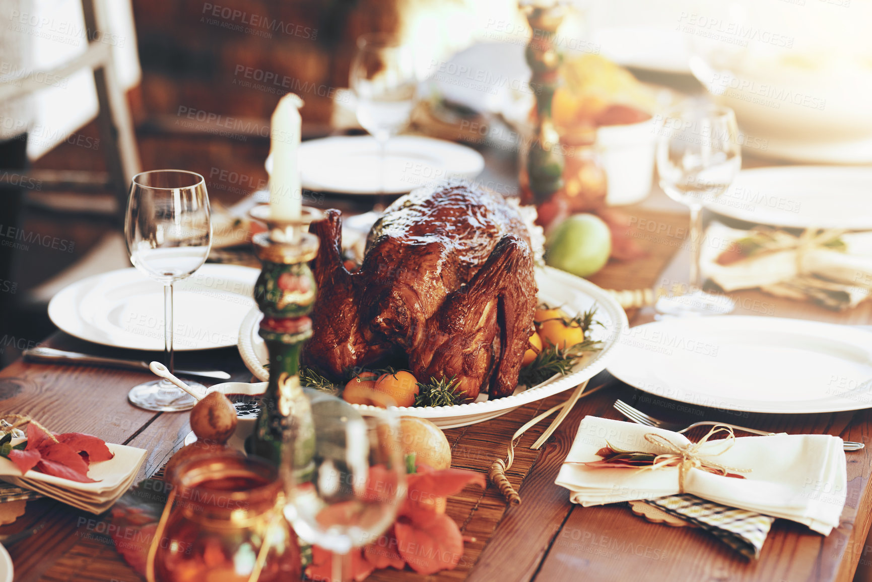 Buy stock photo Thanksgiving, turkey and food with a roast meal on a dinner table for a celebration event or tradition. Christmas, chicken and lunch with a healthy diet on a wooden surface for the festive season