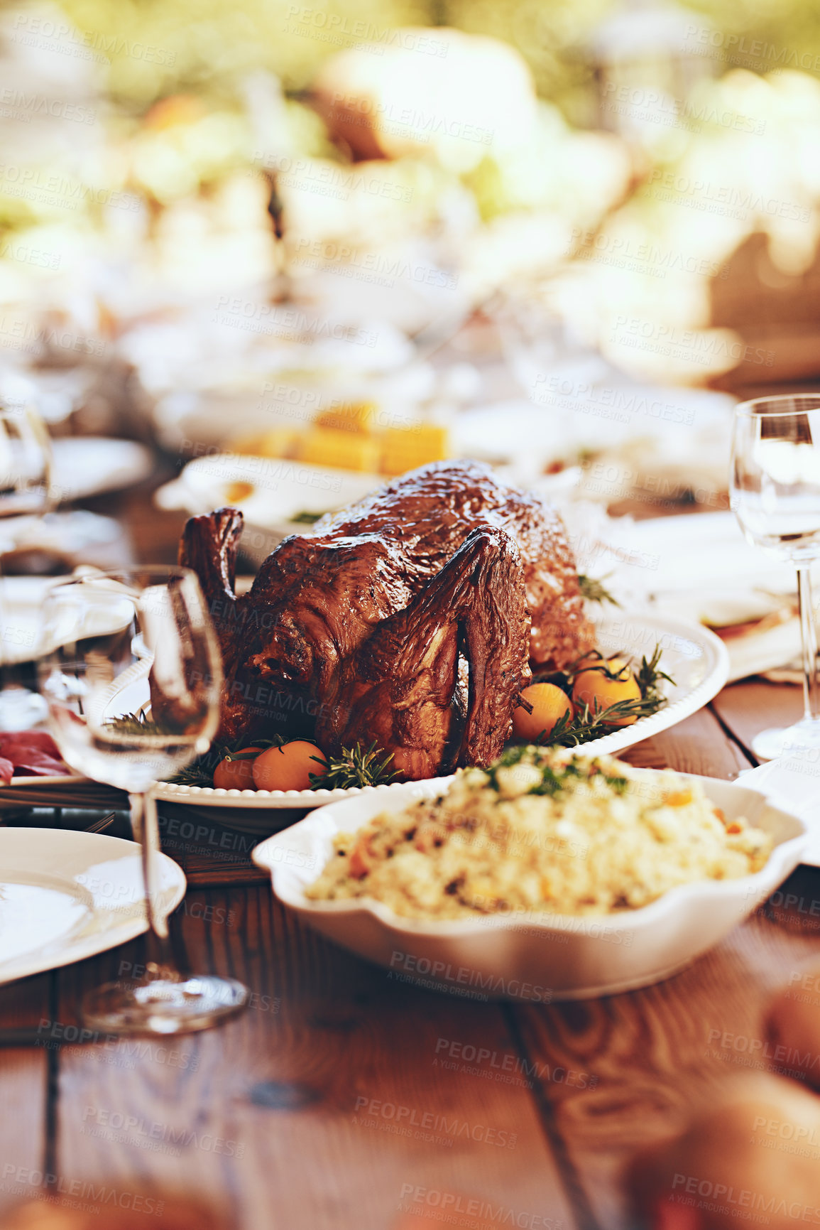 Buy stock photo Thanksgiving, table and food with turkey, chicken or poultry for festive holiday meal by blurred background. Fine dining, celebration or backyard party with healthy poultry at feast, dinner or lunch