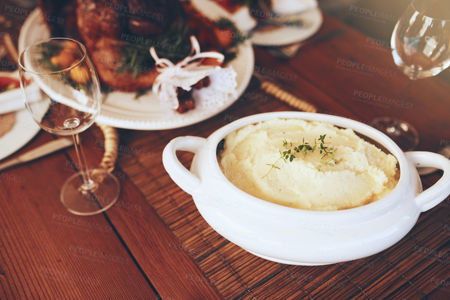 Buy stock photo Food, mashed potatoes and dining table for thanksgiving or Christmas holiday celebration with home cooking for lunch or dinner nutrition. Puree potato, roasted chicken and wine glass background