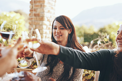 Buy stock photo Toast, celebration and friends at a lunch with love, happy and smile during a patio party. Cheers, food and family with wine to celebrate Christmas or Thanksgiving in the backyard of a house