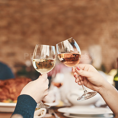 Buy stock photo Hands, wine glass and toast with wine at party, holiday celebration and couple drinking. Dinner party, celebrate together with food, drink and celebrating Christmas, Thanksgiving or anniversary.